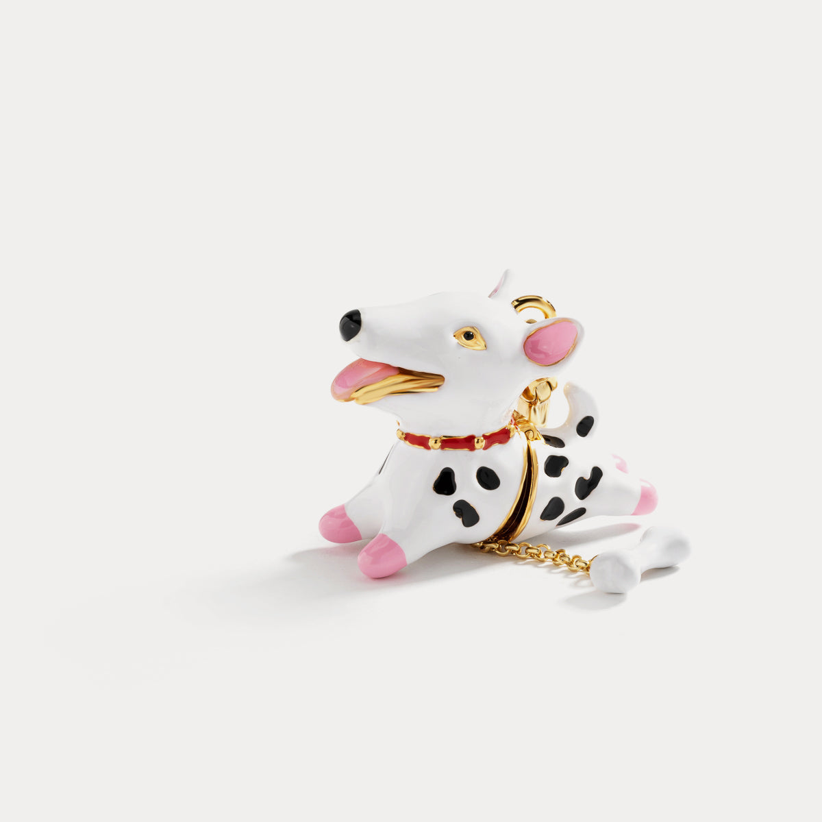 Front-facing enamel Dalmatian dog charm pendant in white and pink with gold details