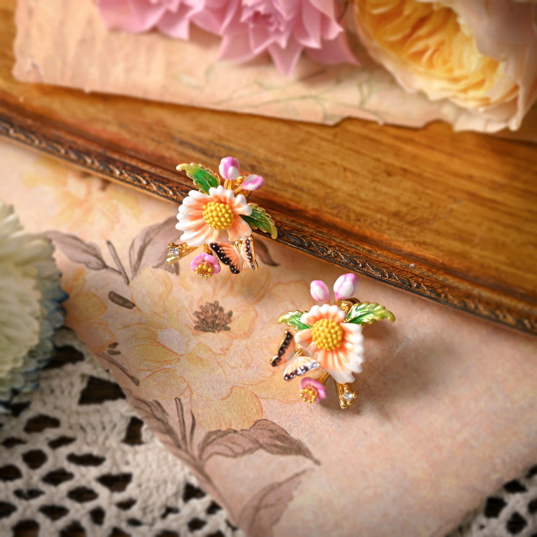 Lotus Dragonfly Bracelet placed on a floral-themed paper with lace and daisies around.