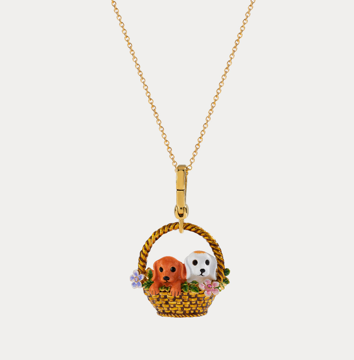Front view of the Puppy Locket Pendant Necklace with two enamel puppies in a woven basket, hanging from a gold chain.