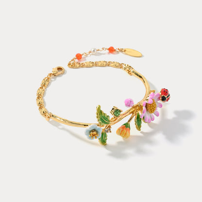 Close-up of Daisy Ladybug Bracelet showing floral and ladybug design on white background