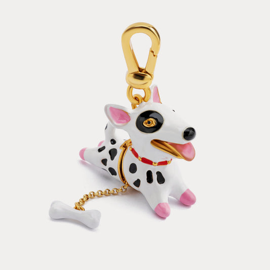 Detailed close-up of Dalmatian dog charm pendant with gold clasp and bone accent