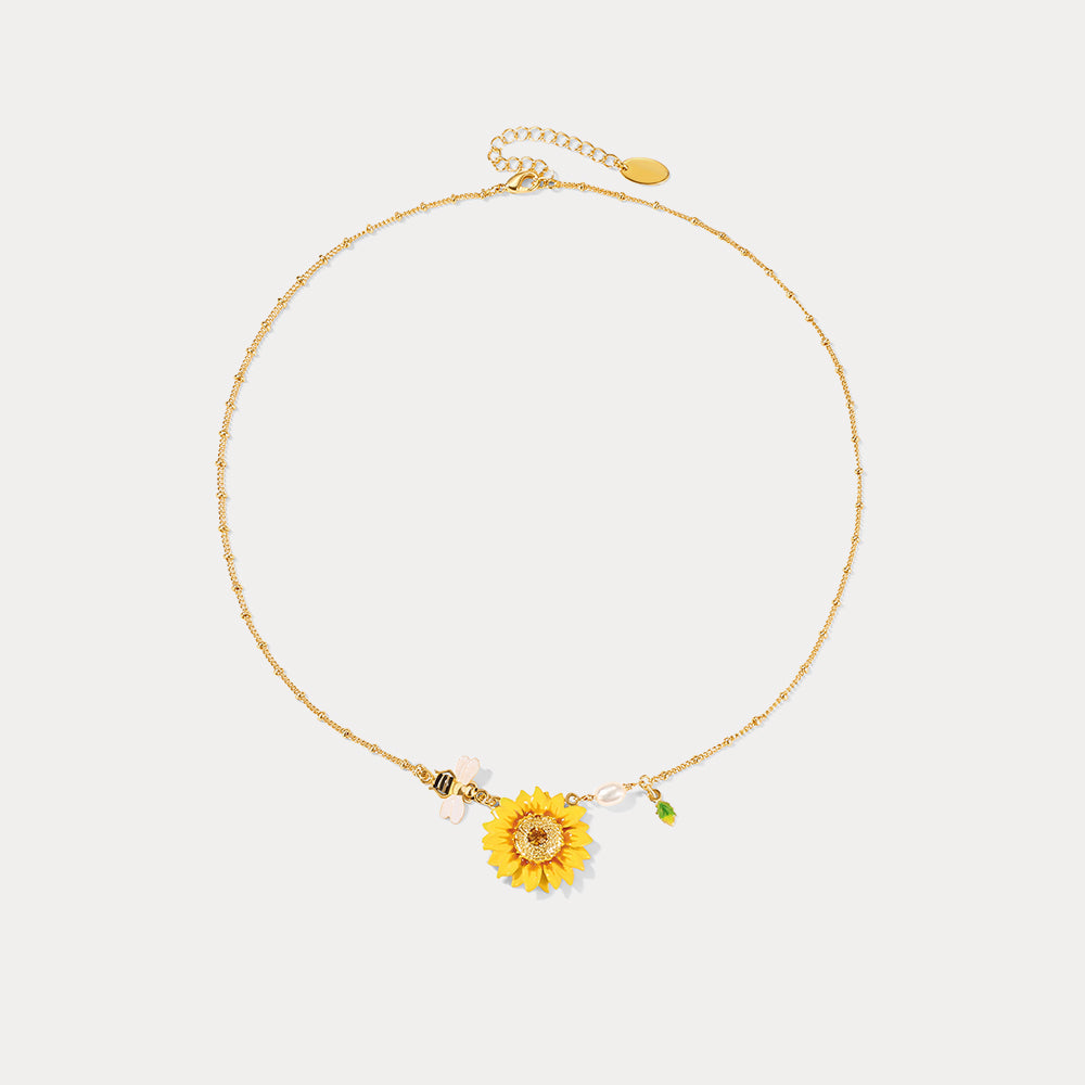 Full view of sunflower pendant necklace with adjustable gold-tone chain