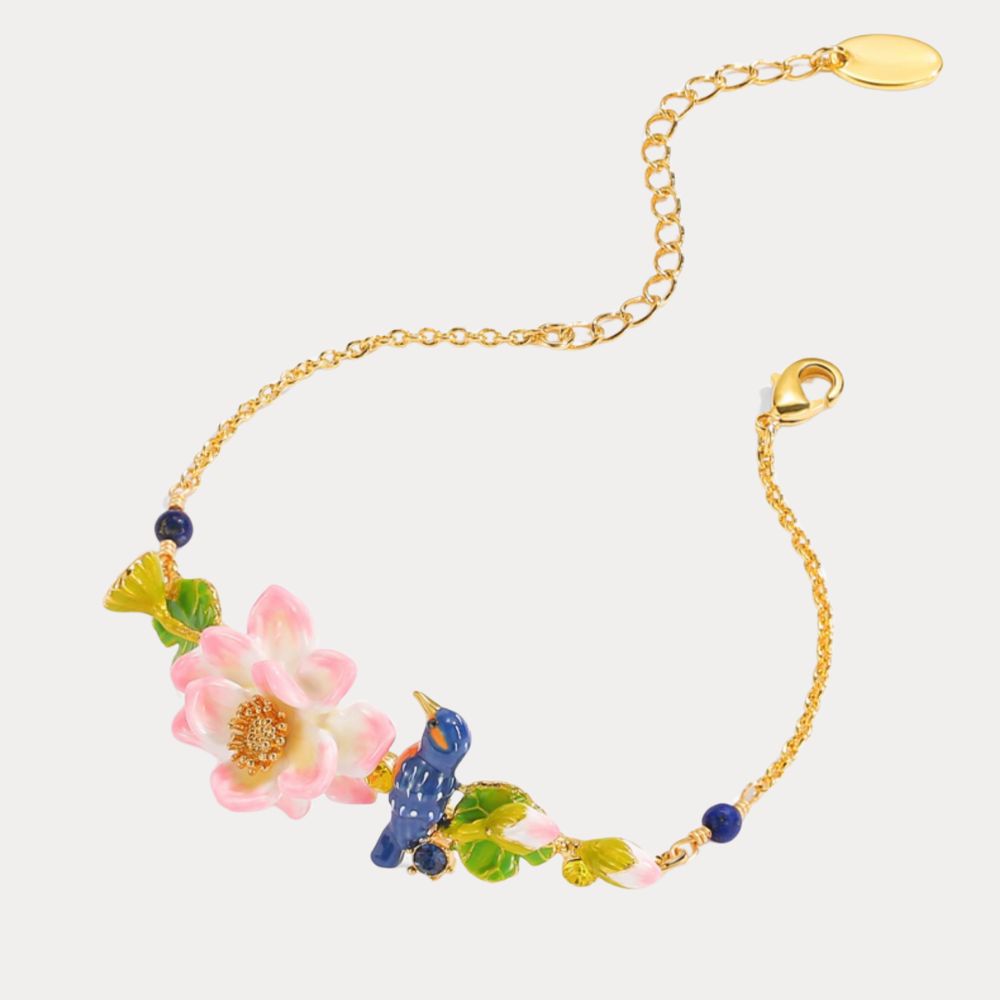 Model wearing the Kingfisher Lotus Bracelet on wrist, hand resting on chin, showcasing the delicate and colorful enamel design.