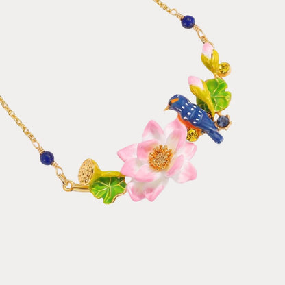 Front-facing centered pendant of Kingfisher Lotus Necklace highlighting enamel lotus and bird design